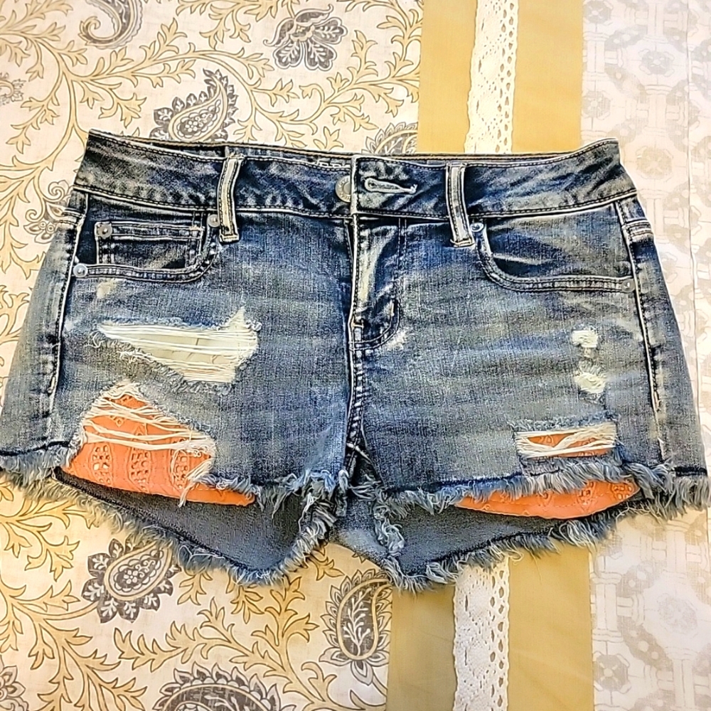 American Eagle Shortie shorts w/ pink cutout details, Sz 4